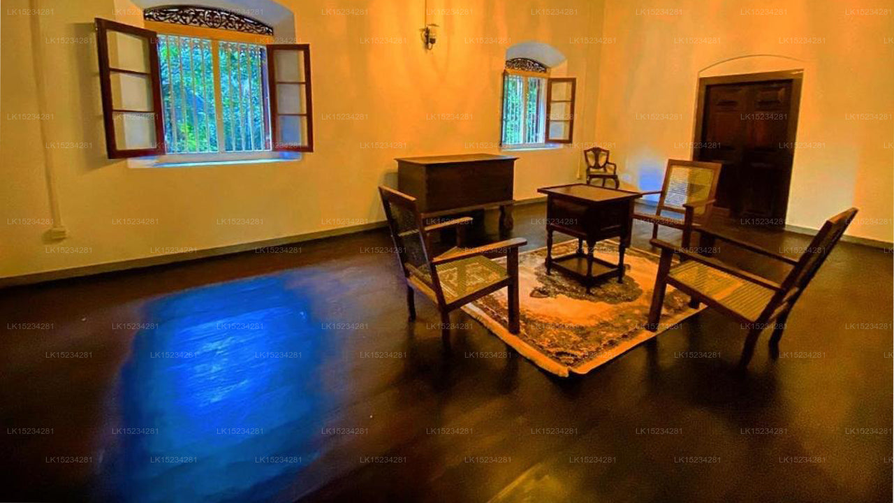 Vintage room with wooden furniture and yellow walls